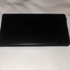 Tumi large black leather wallet NWOT.